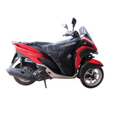 Coprigambe Termoscud®, un coprigambe impermeabile con fodera termica. Su scooter. Di TUCANO URBANO.